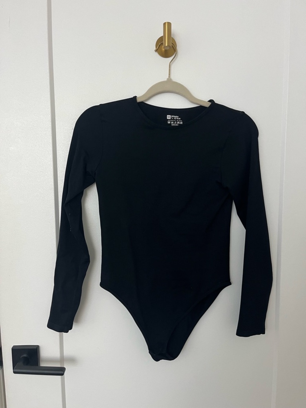 Womens Black Long-Sleeve One-Piece Bodysuit